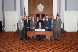 L to R: Mike Weeks, John Sorrell, Dan Carlisle (Lafarge Holcim Cement), Chris McGough (Ready Mix USA), Gov. Bentley, Denzil Schmitz (ABC Polymer), Rep. Barry Moore, Brent Bruser (Truckworx), Kurt Milliman (Sherman Industries)